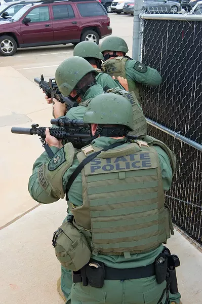 OBN State Police file in a raid postion.Photo/Shannon Cornman - Photo would be good for a cut out.