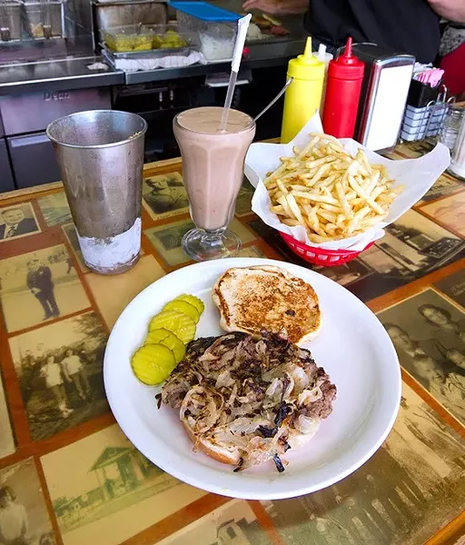 Open faced onion burger at Sid's in El Reno, Oklahoma. File, 7-28-14. - SHANNON CORNMAN