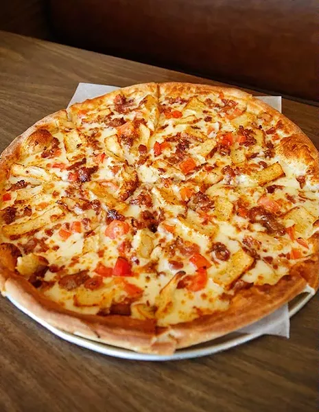 Moody's Alfredo Pizza at Pizzini's Pizza in Oklahoma City, Thursday, April 9, 2015. - GARETT FISBECK