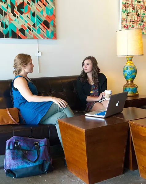 2 female patrons enjoy a little coffee and chat at District Coffee House recently. (Mark Hancock)
