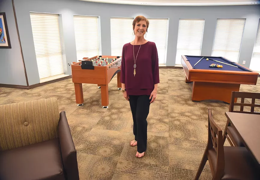 Deb Stanaland, chief support services officer, in the Game Room at the new YWCA Thelma Gaylord Emergency Shelter, 9-15-15. - MARK HANCOCK