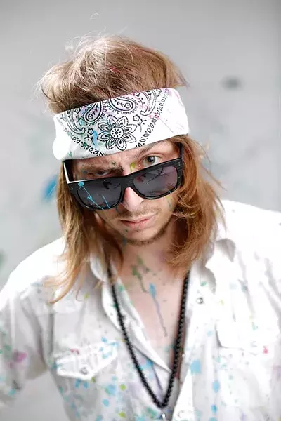 pose for a photo at Studio XII in Oklahoma City, Tuesday, May 26, 2015. - GARETT FISBECK