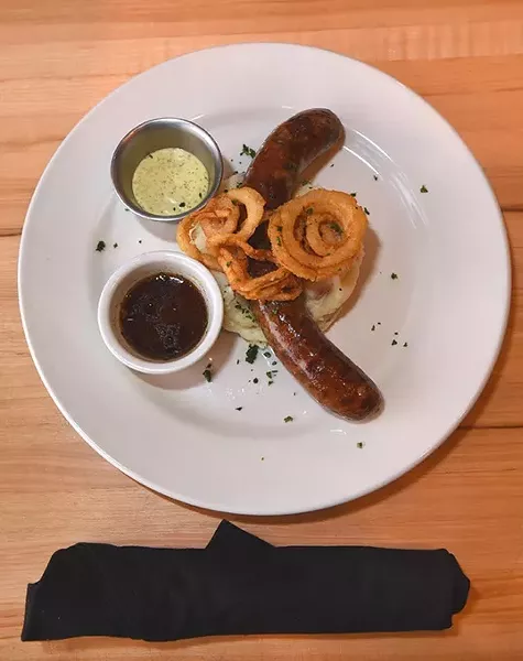 Irish poached bangers are English, at Blackbird Gastropub in Norman, 10-26-15. - MARK HANCOCK