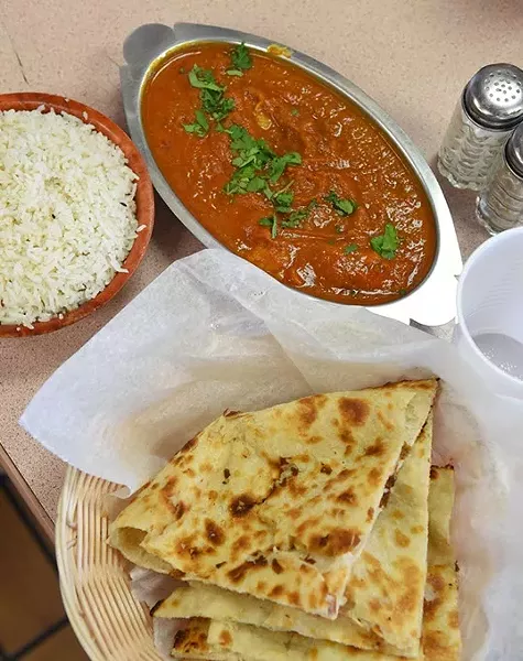 Tandoor restaurant is in the Checkers Truck Stop at 1901 E. Reno. Photo is of Fish Curry with naan and rice. mh