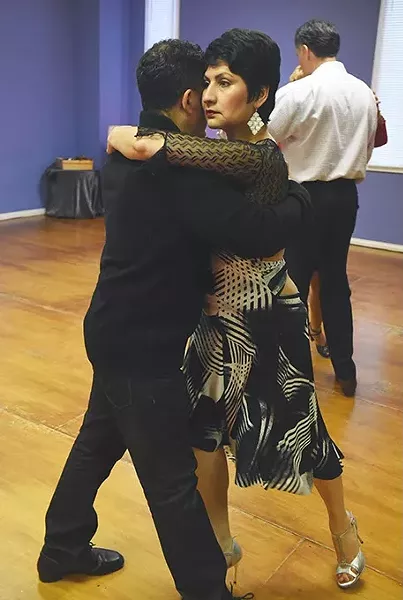 Hazel Lopez, owner of the International Dance Studio, dances with Ricky Sepulveda, where beginning and advance Tango classes are held each Wednesday evening. mh