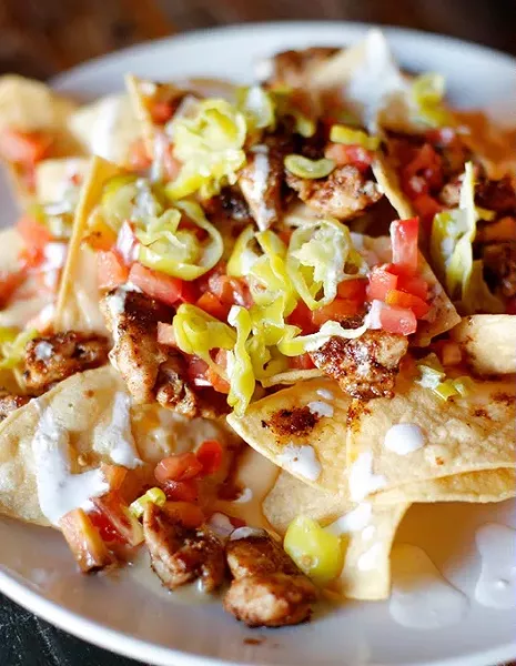 Chicken nachos at Oak & Ore in Oklahoma City, Tuesday, Sept. 22, 2015. - GARETT FISBECK