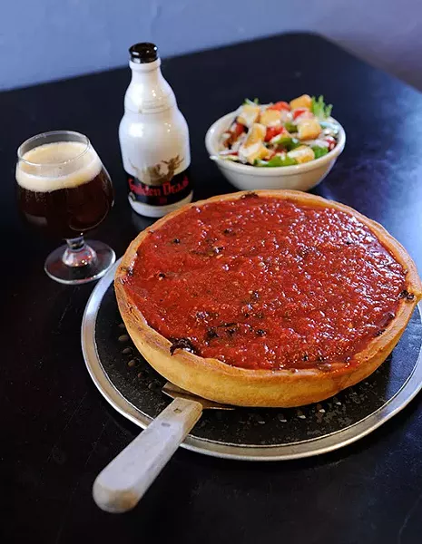 10" Supreme Chicago-style deep dish pizza with a half spinach salad and beer at Humble Pie in Edmond, Tuesday, Jan. 14, 2015. - GARETT FISBECK