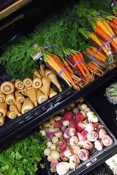 Colorful produce during opening day of Native Roots Market, 131 nw 2nd, on the first floor of Level Urban Apartments, 11-16-12. mh