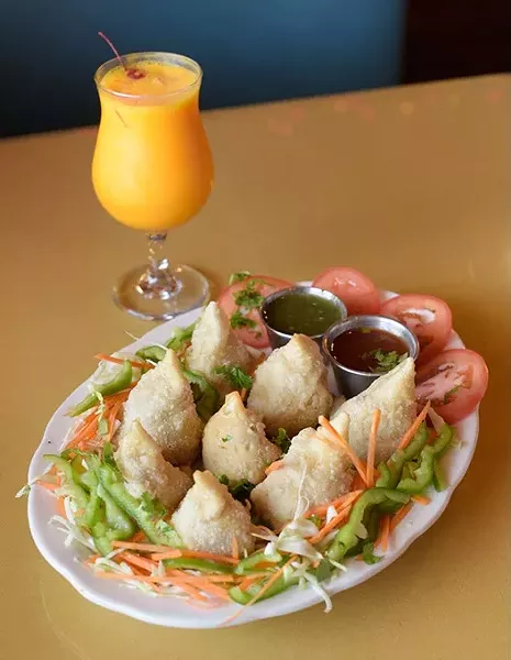 Samosas and mango lessi at Taj Cuisine of India in Oklahoma City, Thursday, Oct. 27, 2016. - GARETT FISBECK