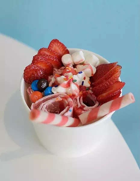 Strawberry ice cream at Rolling Ice Cream & Crepes in Edmond, Monday, July 31, 2017. - GARETT FISBECK