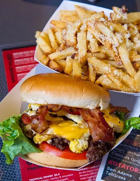 The Egg-O-Nater with bacon and a side of garlic and parmesan french fries at The Garage.Photo/Shannon Cornman - SHANNON CORNMAN