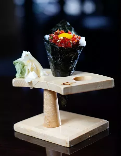 Toro-tartar hand roll at Okura Sushi in Oklahoma City, Wednesday, Nov. 11, 2015. - GARETT FISBECK