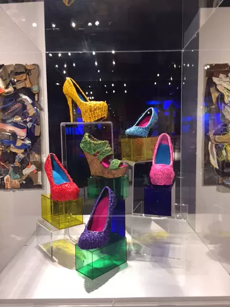 “Walking in Their Shoes” is artist Gayle Curry’s encaustic contribution to Science Museum Oklahoma exhibit Sole Expression: The Art of the Shoe, on display now. (Photo provided)