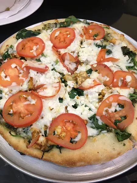 Sergio’s pizza crust is made in-house and baked on a pizza stone. | Photo Jacob Threadgill