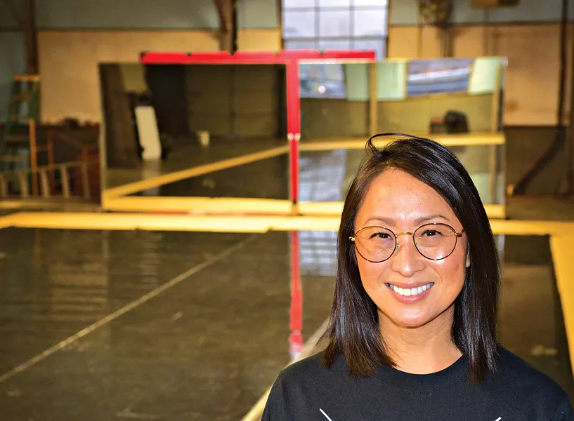 RACE Dance Company executive director Hui Cha Poos inside the company’s new studio at 705B W. Sheridan Ave. | Photo Jacob Threadgill