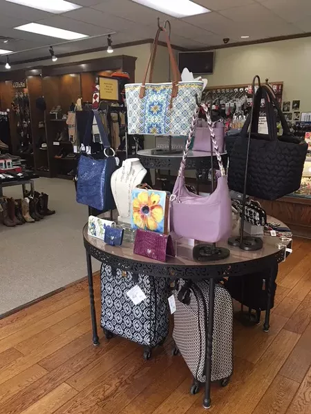 In addition to a large selection of footwear, Daniels Shoes offers Brighton handbags and luggage. - KIMBERLY LYNCH