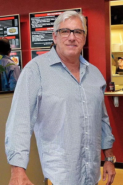 Rick Haynes co-owns Johnnie’s Charcoal Broiler with his brother David. - GAZETTE / FILE