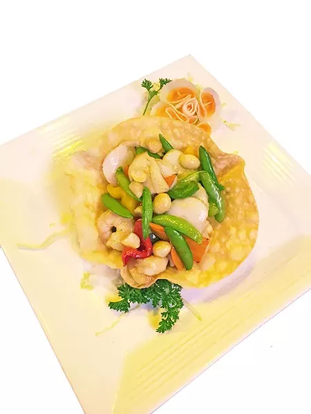 Shrimp and scallops in a wonton bowl - JACOB THREADGILL