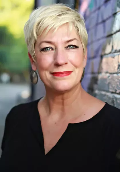 Sara Cunningham is the founder of Free Mom Hugs, but she credits her advocacy to people who came before her and paved the way for LGBTQ+ rights. - VALERIE ROLLINS / WITH U IN MIND PHOTOGRAPHY / PROVIDED