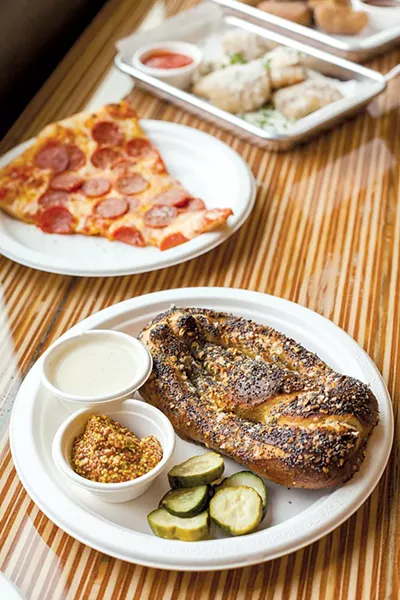 Banquet Cinema Pub’s poppy seed and onion pretzel, pepperoni pizza - PROVIDED