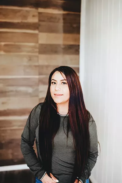 Mayra Pacheco and her husband Rafael own The Green Dot, a Norman cannabis dispensary that has been given 30 days’ notice that it has to relocate due to its proximity to Norman High School. - ALEXA ACE