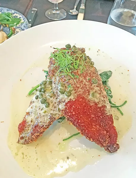 Chicken schnitzel with lemon, capers and sautéed spinach - JACOB THREADGILL