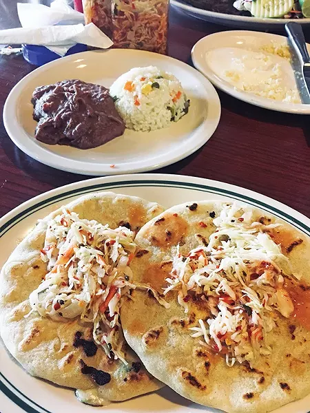 Pupusas topped with curtido, a marinated cabbage - slaw in vinegar and chile - JACOB THREADGILL