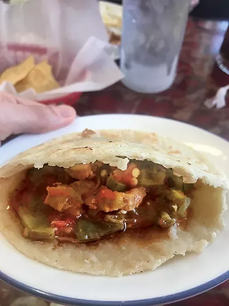 A corn gordita with pork and cactus - JACOB THREADGILL