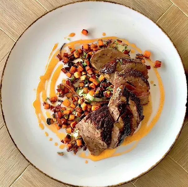 Nishyobi Akaushi steak is made from Oklahoma-bred descendants of the Japanese cattle with smoked paprika caramel, sweet potato, chorizo and blue cheese. - PROVIDED