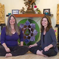 Martha McQuaid and Christina Forth at Spirit Yoga.
    Photo by Shannon Cornman