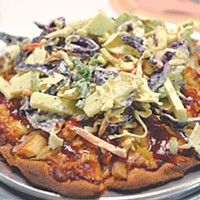 The Thanks Gramps pizza features coleslaw added post-bake. (Jacob Threadgill)