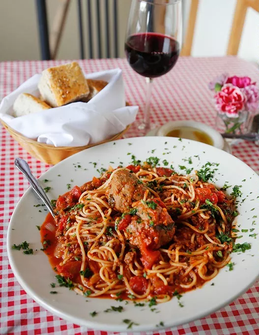 Spaghetti with meat sauce and meat balls at Vito's Ristorante in Oklahoma City, Thursday, July 30, 2015. - GARETT FISBECK