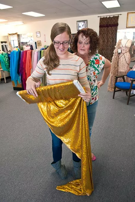 Lorena Ballard (left) and Lesa MacDonald admire the fabric selection at Helen Enox Fine Fabrics (Mark Hancock)