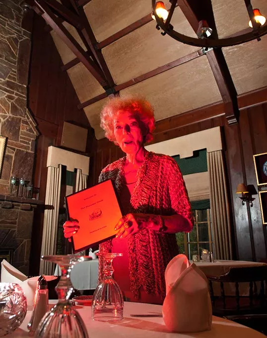Owner Marian Thibault in the large dining room at the Haunted House Restaurant. mh