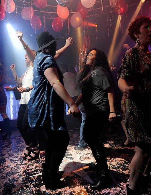 People dance at Groovys in Oklahoma City, Saturday, Feb. 14, 2015. - GARETT FISBECK