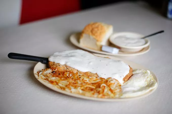 Chicken fried steak, fried eggs, hashbrowns, buscuits and gravy at 50s Cafe in Oklahoma City, Friday, June 26, 2015. - GARETT FISBECK