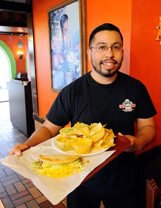 Elodio Santillan poses for a photo at Taco Rico in Oklahoma City, Wednesday, July 8, 2015. - GARETT FISBECK