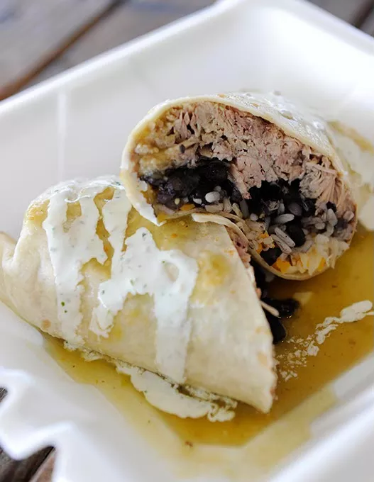 Carnitas burrito at Burrito Bandido in Oklahoma City, Wednesday, March 11, 2015. - GARETT FISBECK
