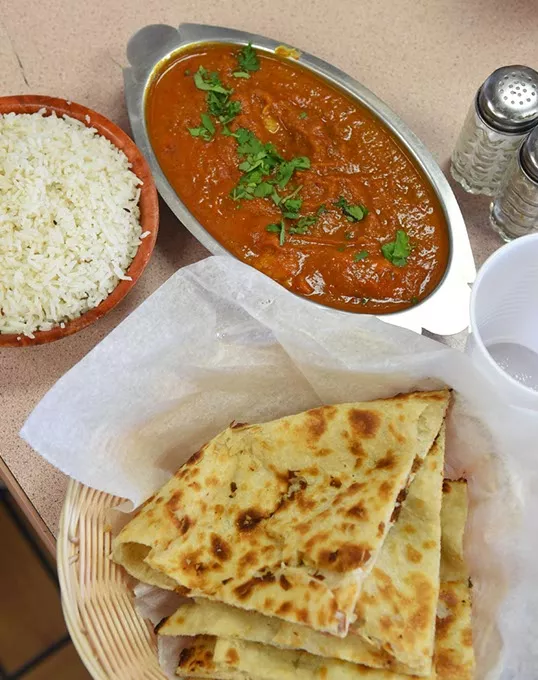 Tandoor restaurant is in the Checkers Truck Stop at 1901 E. Reno. Photo is of Fish Curry with naan and rice. mh
