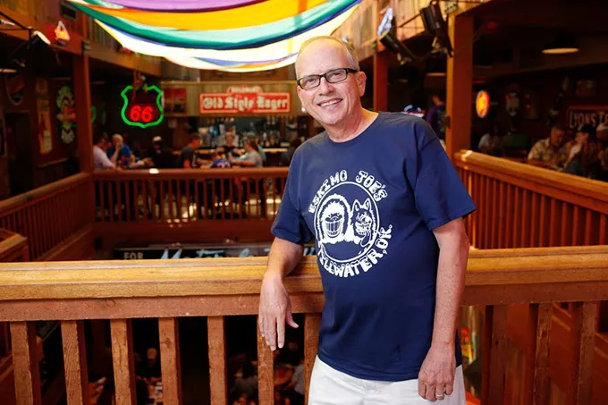 Stan Clark pauses inside his flagship Eskimo Joe’s restaurant in Stillwater. (Garett Fisbeck)