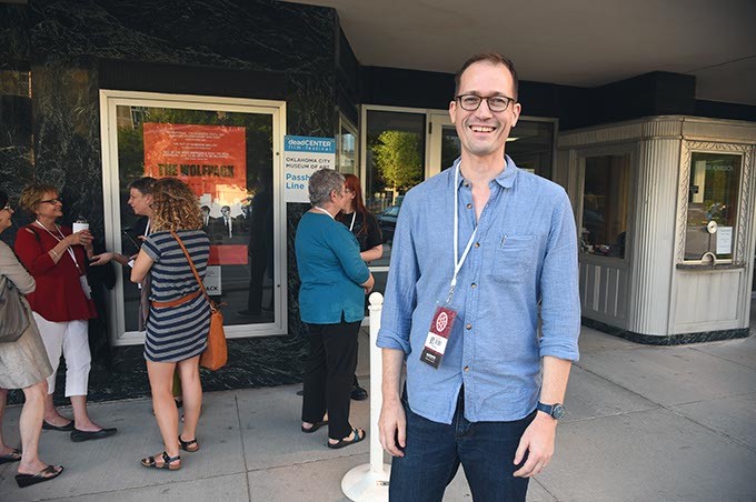 Brian Herndon outside the OCMOA with a line of people waiting to attend the screening of Rolling Papers during the DeadCenter Film Festival, 6-11-2015.  Mark Hancock