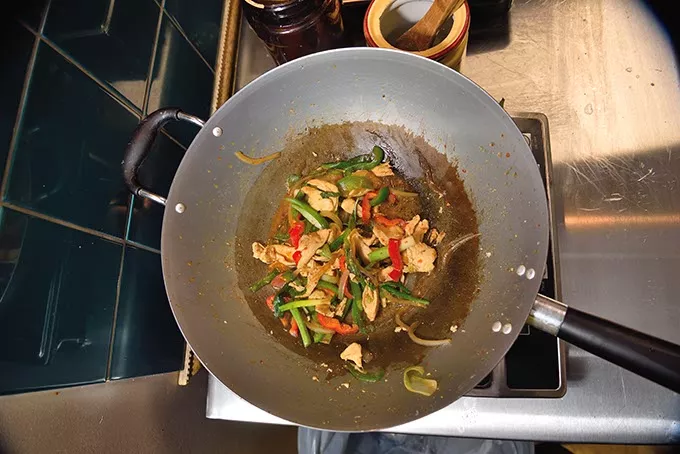 Basil Stir-Fry, in the wok during preparation at Thai Rice & Noodle Cafe in Del City, 12-28-15. - MARK HANCOCK