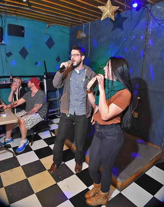 Chris Aaron and Tara Samules run their Pro Sound Karaoke, nights at Cookies, and that's Dillon Dakota Carroll and Robin FriedRich giving what they have on a recent Thursday night, 2-11-16. - MARK HANCOCK