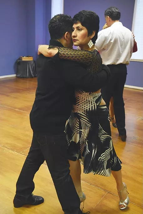 Hazel Lopez, owner of the International Dance Studio, dances with Ricky Sepulveda, where beginning and advance Tango classes are held each Wednesday evening. mh