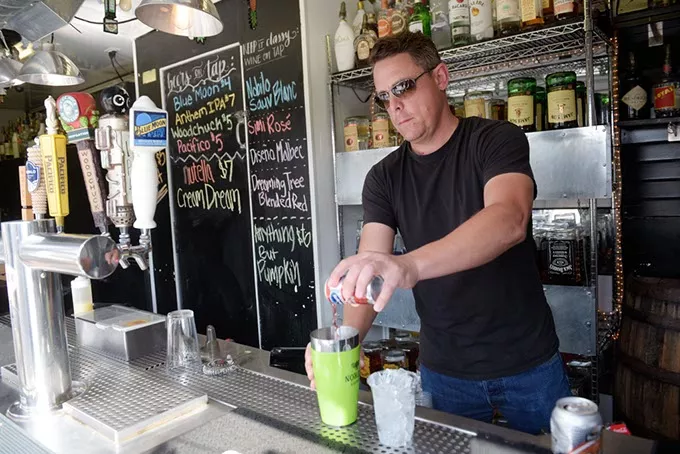 ?Eric Likens makes a Cranberry Up In Yo Rita at Blue Garten, Tuesday, Oct. 4, 2016. - GARETT FISBECK