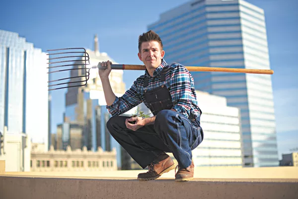 As SixTwelve’s director of permaculture, Paul Mays oversees a thriving community garden. (Photo Garett Fisbeck)