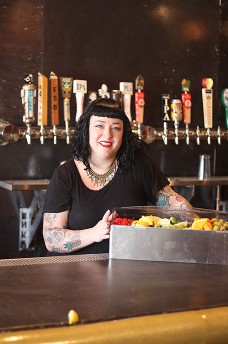 Pump Bar co-owner Hailey McDermid guards the fruit tray, which is not a snack bar for customers. (Greg Elwell)