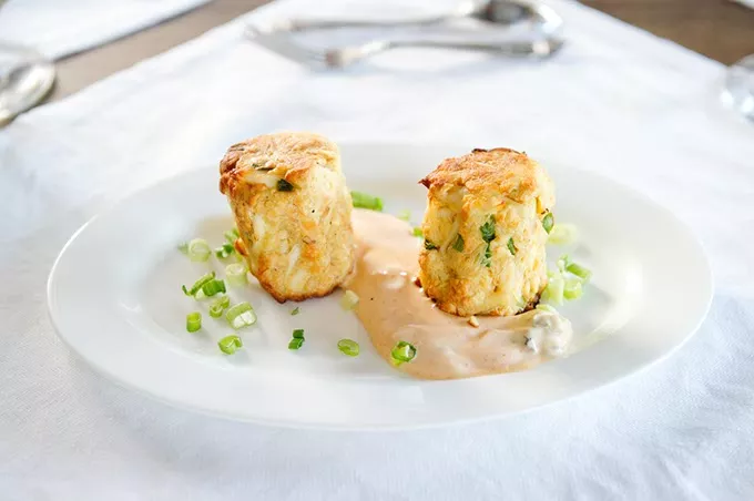 Lump crab cakes at Meat Market Refectory, Wednesday, July 6, 2016. - GARETT FISBECK