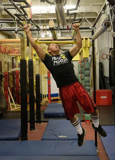 Dominic Pham goes through a drill at his ninja obstacle course. - GARETT FISBECK