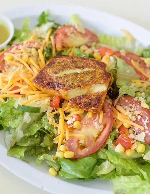 Tropical salad with tofu at Green & Grilled, Friday, Sept. 1, 2017. - GARETT FISBECK